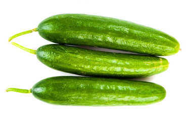 Healthy food. The green cucumbers isolated on white background