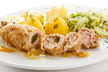 Roasted stuffed pork chop and vegetables