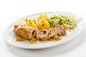 Roasted stuffed pork chop and vegetables