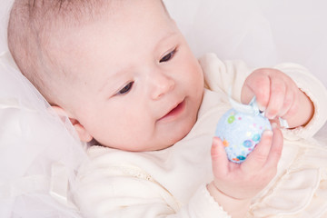 Funny child with easter eggs in basket