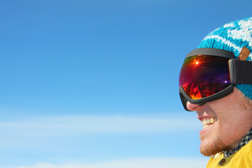 portrait of a smiling snowboarder