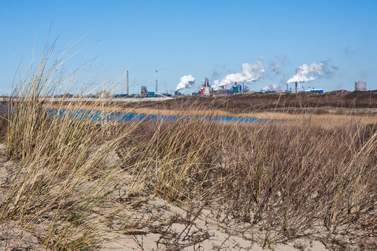 Dutch steel factory seen from the dunes along the coast