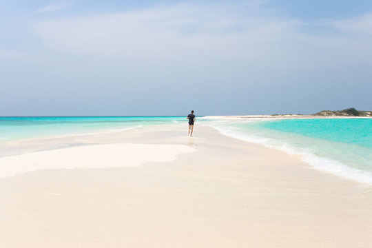 Man jogging on the beach