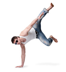 young man in jeans jumping