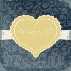 Golden vintage gift card with heart shaped copyspace.