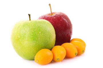 Apples and kumquates   isolated on white