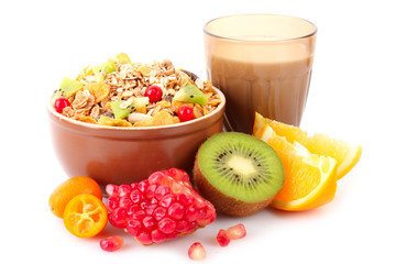 Yoghurt, muesli, milk and fruits isolated on white