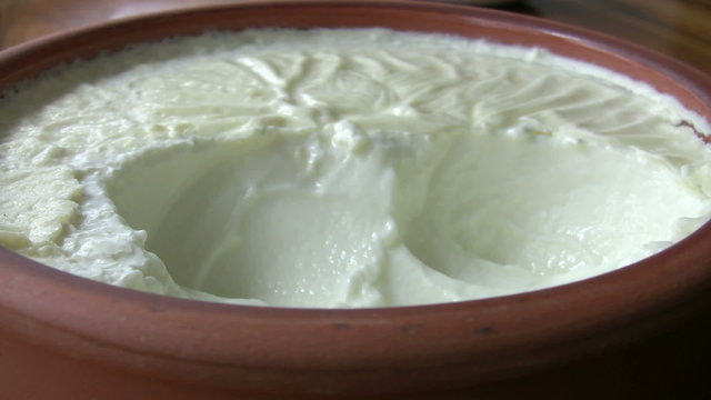 Homemade yogurt in a clay bowl