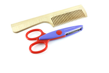 Wooden comb and scissors