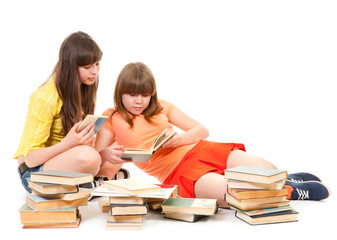 Two schoolgirls read many books