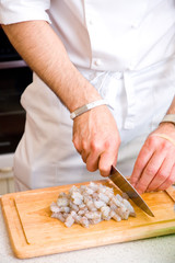 chef cutting the shrimp