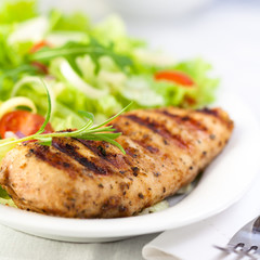 Grilled chicken fillet with vegetable salad