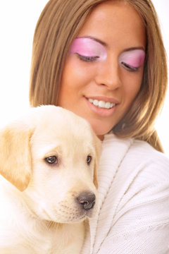 Young woman and sweet puppy