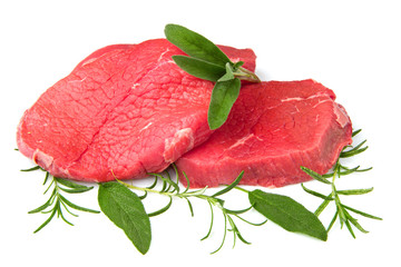 red meat with sage and rosemary  isolated on white background
