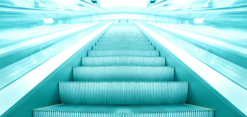 blue escalator in motion