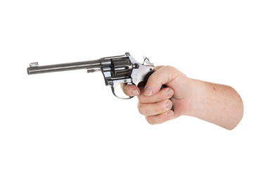 handgun cocked in a hand isolated on white