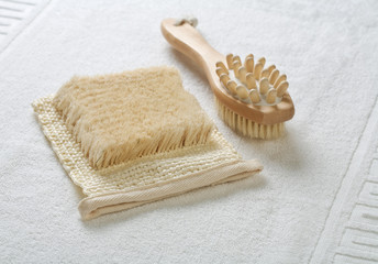 close up view on the bast and massager on white towel