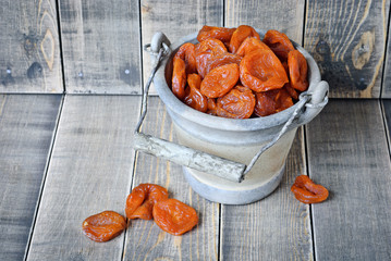 Dried apricots in a bucket