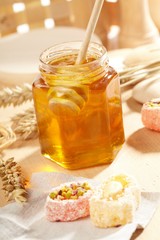 Honey with wood stick