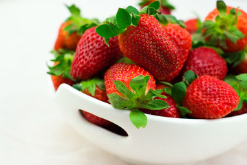 Fresh strawberries on a white background