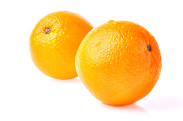 Close up that two oranges isolated on the white background.