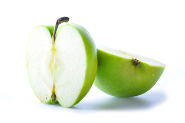 Two pieces green apple isolated on white background.