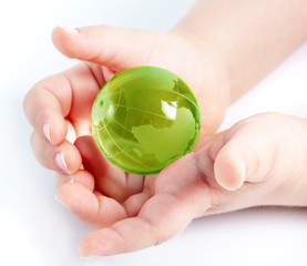 child holding globe in hands