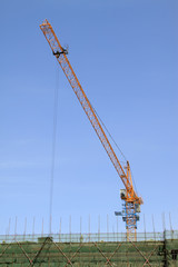 tower crane under the blue sky