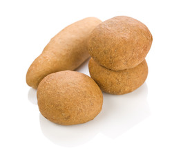 one long and three round loafs of bread