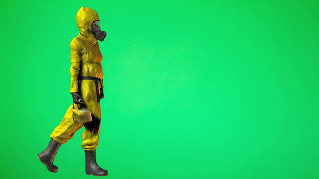 Person walking in HAZMAT Suit with geiger counter