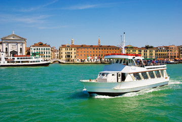Venetian Lagoon and the white big cutter, Venice, Italy