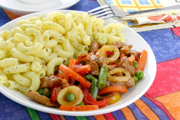 Pasta with pork meat and vegetables