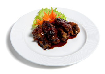 Roast chicken wings on a plate
