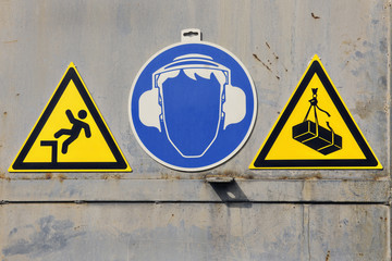 Safety signs on a factory door