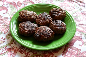 Six charcoal grilled hamburgers