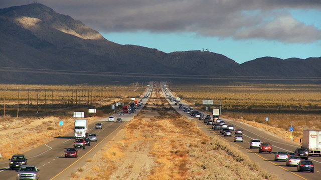 Busy Traffic Pollution on Desert Highway