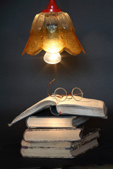 Books Under Lamp