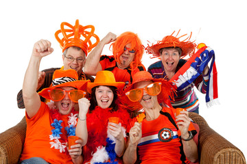 Group of Dutch soccer fans over white background