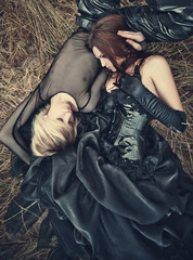 Young goth couple outdoors