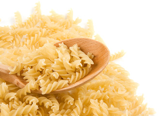 raw paste and wooden spoon on white