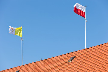 Vatican and Polish flag