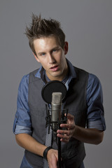 Handsome male is singing