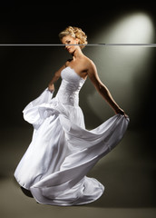 beautiful girl wearing luxurious wedding dress