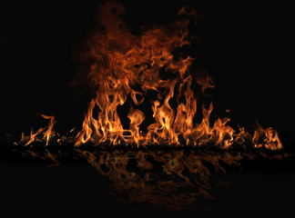 Fire flames with reflection on black background