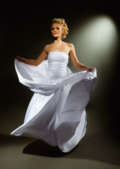 Fototapeta premium beautiful girl wearing luxurious wedding dress