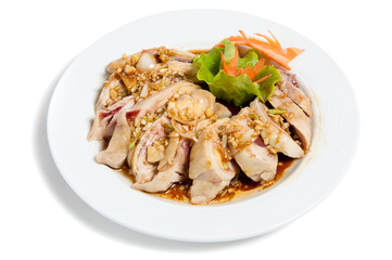 Roasted hen in sauce on a plate