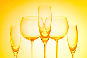 Wine glasses against gradient background
