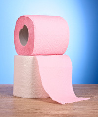 Toilet paper on blue background