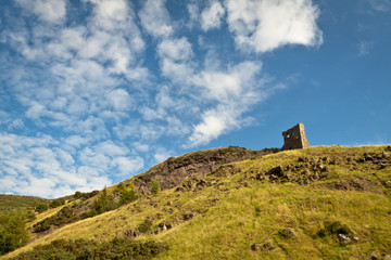 Fototapeta na wymiar Ruins of monasteries on hill near Holyrood Park