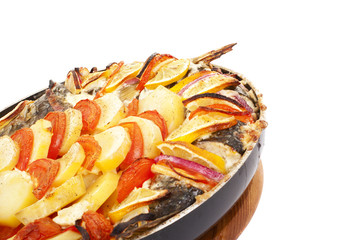 Haarder stuffed baked with potatoes and tomatoes